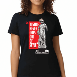 A woman wearing a Tshirt that says Justice never goes out of style.